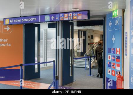 Manchester UK Border Force airport passport control entrance. Inspection gate of travelers from United Kingdom EU & select countries in MAN airport. Stock Photo