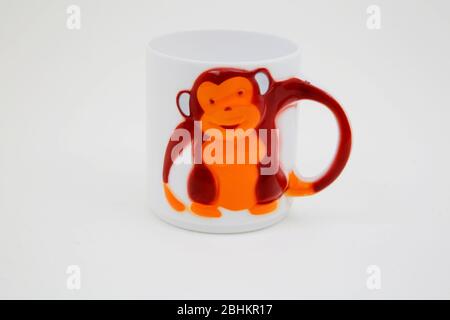 Ceramic Mug with Monkey Design Stock Photo