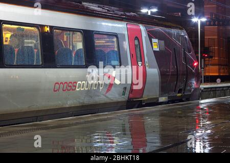 Arriva Crosscountry Trains class 221 diesel voyager train at Leeds on a wet night showing the Crosscountry logo. Stock Photo