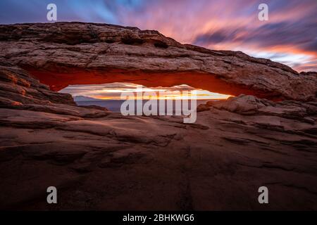 The famous Mesa Arch in Canyonlands National Park in Utah. Stock Photo