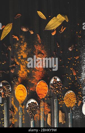 Desi food spices on wooden table Stock Photo