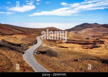 Road through the dry desert highlands of Santo Antao, Cape Verde, post processed in HDR Stock Photo