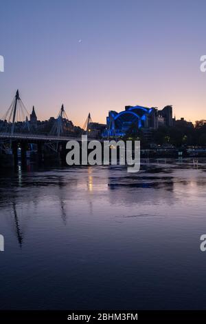 Hungerford Bridge, Golden Jubilee Bridges, Charing Cross Station and the Thames at twilight, London, UK Stock Photo