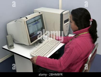 Woman on PC computer 2006 Stock Photo