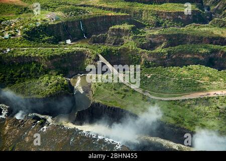 Victoria Falls or 'Mosi-oa-Tunya' (The Smoke that Thunders), Zambezi River, and Victoria Falls Bridge, Zimbabwe / Zambia border, Southern Africa - aer