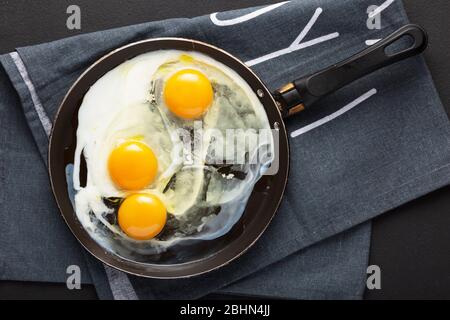 frying pan, sunny side, breakfast, scrambled egg, cast iron, over easy, cooked egg Stock Photo