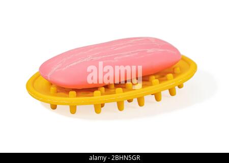 yellow soap dish on white Stock Photo