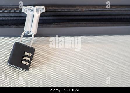 small Luggage lock, magnetic closure combinations, safety on the road, macro close-up Stock Photo