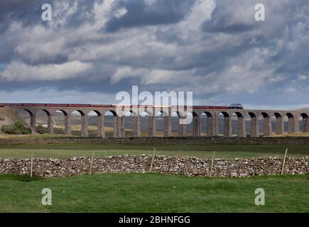 Steam locomotive 45231 The Sherwood Forrester crossing Ribblehead viaduct on the settle to Carlisle line with the West coast railways fellsman train Stock Photo