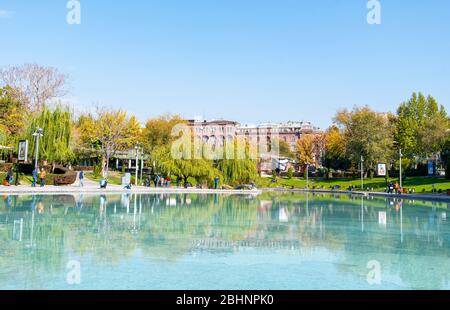 YEREVAN - NOV 04: Swan lake in city park of Yerevan on November 04. 2017 in Armenia Stock Photo