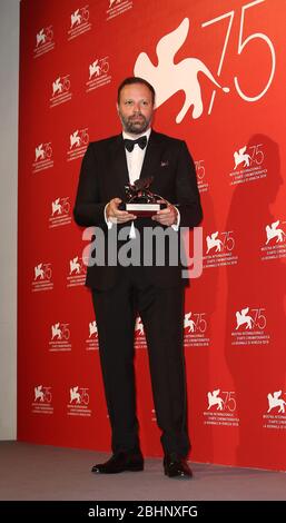 VENICE, ITALY - SEPTEMBER 08: Yorgos Lanthimos poses with the Silver Lion for 'The Favourite' at the Winners Photocall Stock Photo