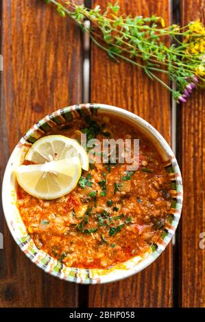 fish stew in a rustic bowl Stock Photo