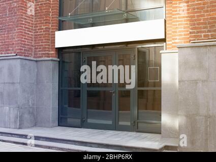 Blank white rectangular box store entrance mockup, glass brick wall Stock Photo