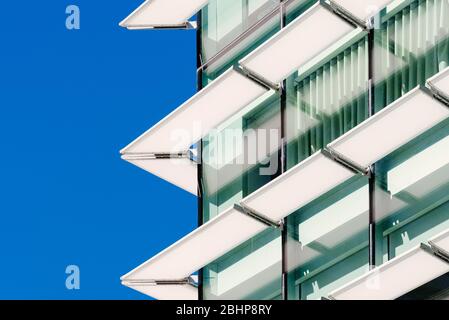 Architecture abstract background. Glass curtain walls with lattices elements. Facade detail Windows Stock Photo