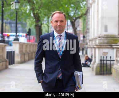 London, UK. 27th Apr, 2020. Sir Simon Stevens, CEO of the National Health Service, arrives at Downing Street for the Covid-19 meeting, Stock Photo