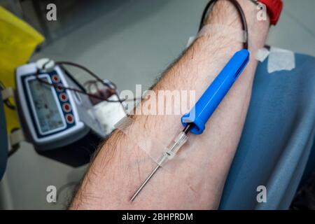 London, UK. 27th Apr, 2020. A blood donation to the West End Donor Centre - Blood is still required by the NHS and therefore donation centres are still open with increased social distancing, staff in masks and liberal amounts of hand gel in use. Credit: Guy Bell/Alamy Live News Stock Photo