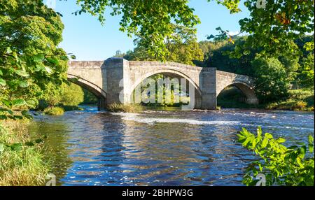 View of the River Wharfe and Barden Bridge in Wharfedale, Yorkshire Dales National Park Stock Photo