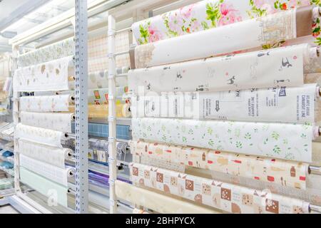Many patterns of plastic tableclothes on its rolls for sell in Homepro department store Huahin, Thailand April 30 ,2018 Stock Photo