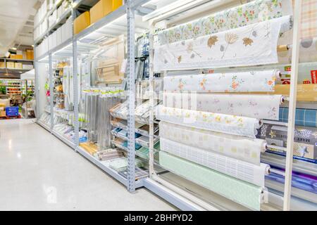 Many patterns of plastic tableclothes on its rolls for sell in Homepro department store Huahin, Thailand April 30 ,2018 Stock Photo