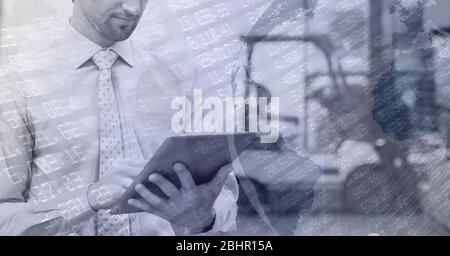 Digital illustration of man using digital tablet working in warehouse over data processing Stock Photo