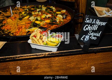 https://l450v.alamy.com/450v/2bhr4ke/seafood-paella-cooked-in-a-large-pan-wok-street-food-festival-mexican-fiesta-national-day-dish-specialty-live-cooking-station-fresh-food-buffet-br-2bhr4ke.jpg