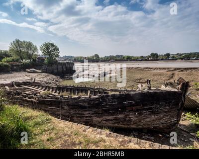 old boat hull wreck wooden and worn boat hull background on beach Stock ...