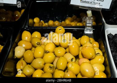 Turkish olives different mix for sale in Grand Bazaar, Egyptian outdoor market. Fresh produce in marketplace, Greek varieties also. Stock Photo