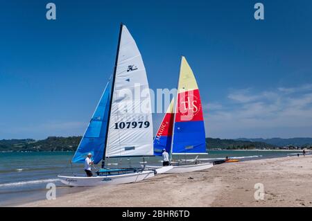 Sailboats at Buffalo Beach over Mercury Bay in town of Whitianga, Coromandel Peninsula, Waikato Region, North Island, New Zealand Stock Photo