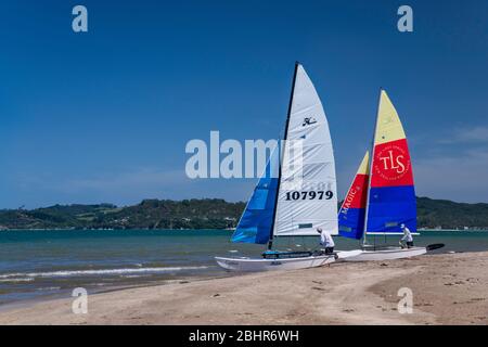 Sailboats at Buffalo Beach over Mercury Bay in town of Whitianga, Coromandel Peninsula, Waikato Region, North Island, New Zealand Stock Photo