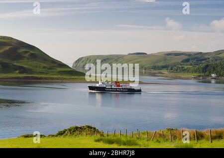 Davaar Island, by Campbeltown, Kintyre, Argyll with MV Isle of Arran Stock Photo