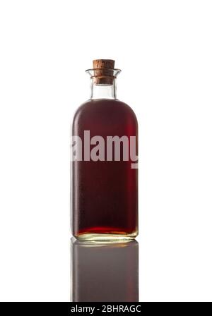 Classic bottle of red vermouth on white background. Isolated image. Vertical image. Stock Photo