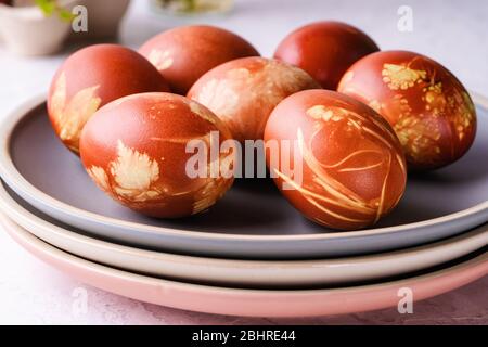 Naturally dyed with onion shells Easter eggs, springtime  plants, zero waste concept, sustainable living Stock Photo