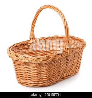 Big square brown wicker basket on a white background. Stock Photo