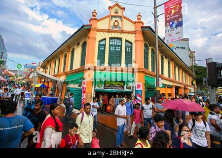 migrant workers in little india street singapore,singapore,little india singapore,colourful little india,indian migrants singapore,wall paintings Stock Photo