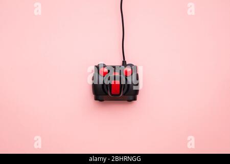 A retro video game joystick controller. Overhead view Stock Photo