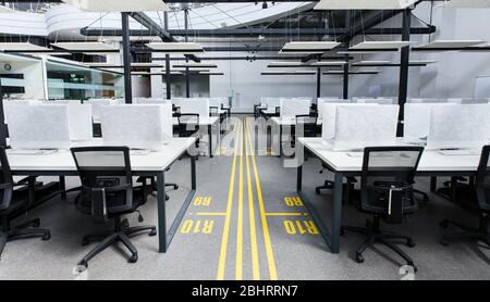 Big office with covered computers with no workers Stock Photo