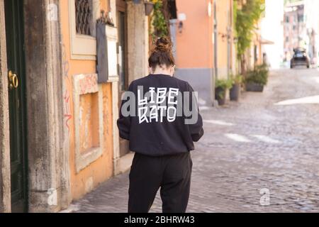 Roma, Italy. 27th Apr, 2020. Girl in Trastevere district in Rome (Photo by Matteo Nardone/Pacific Press) Credit: Pacific Press Agency/Alamy Live News Stock Photo