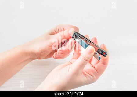 Close Up Female Arms Cutting Cuticle From Girl Thumb. Profession Concept  Stock Photo, Picture and Royalty Free Image. Image 98106857.