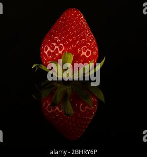Sweet strawberries, shot on studio with two strobe lights with a black background Stock Photo