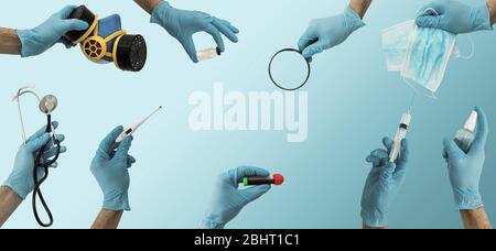 many hands holding medical tools on blue Stock Photo