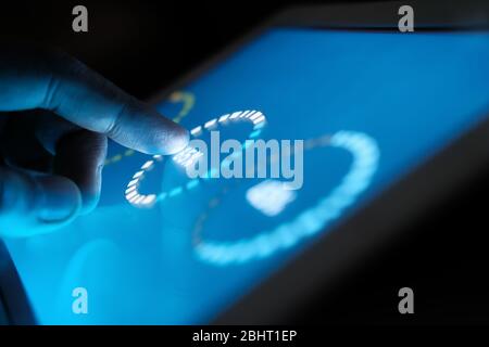 person hand analyzing financial data on digital tablet  Stock Photo