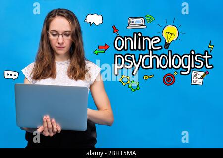 Online psychologist concept with icons with girl in casual clothes on a blue background sits in glasses and looks into a laptop. Close up. Stock Photo