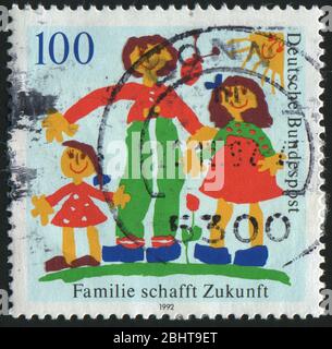 GERMANY- CIRCA 1992: stamp printed by Germany, shows family, circa 1992. Stock Photo