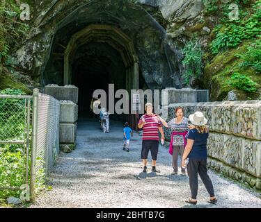 OTHELLO TUNNELS, CANADA - JULY 1, 2019: family taking pictures at popular tourist destination. Stock Photo