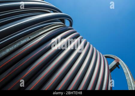 Industrial hose on a construction site. Stock Photo