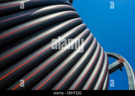 Industrial hose on a construction site. Stock Photo