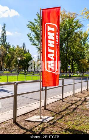 Samara, Russia - September 7, 2019: Flag with logo of Magnit store - russia's largest retailer Stock Photo