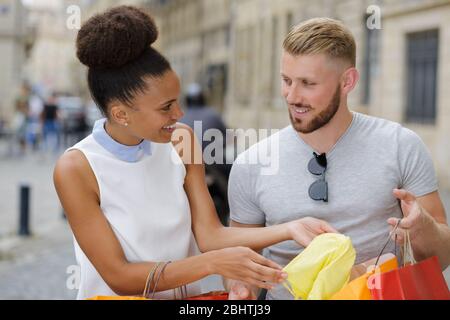 young happy couple on shopping spree Stock Photo