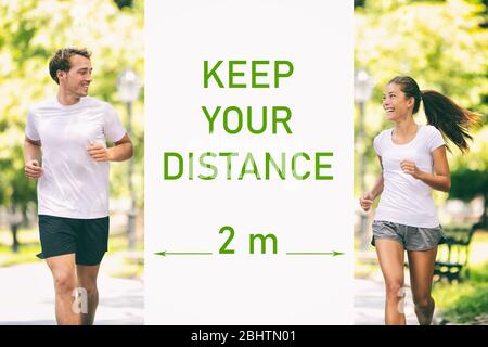 Social distance. two people keep spaced between each other for social ...
