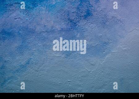 Abstract blue color tone painted wall texture background outdoors Stock Photo